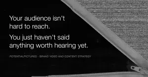 A zipper opening through static noise revealing the words: Your audience isn't hard to reach. You just haven't said anything worth hearing yet.