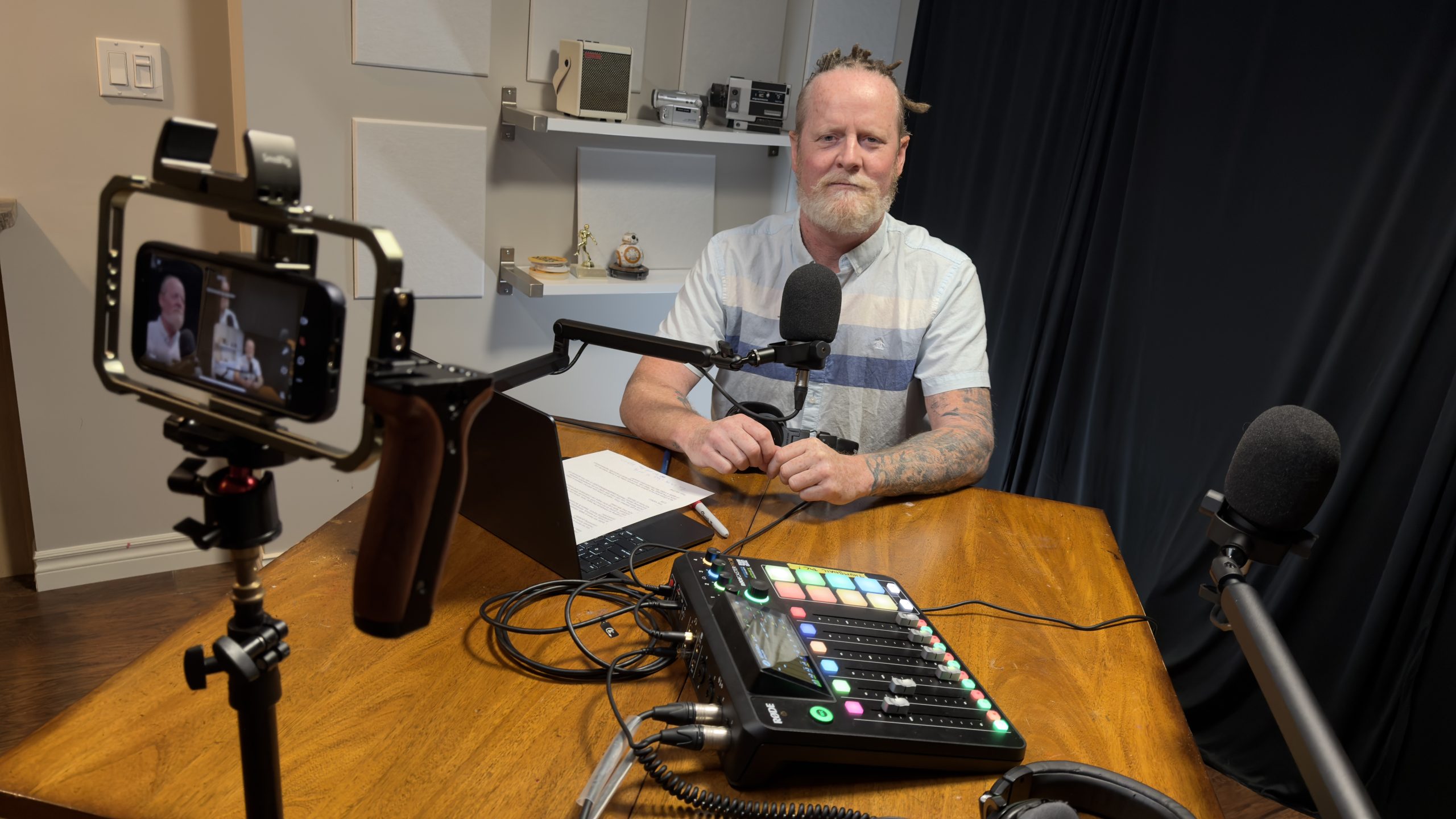 Multi-camera video podcast setup with camera rig, mixer and broadcast microphone in a Vancouver podcast studio