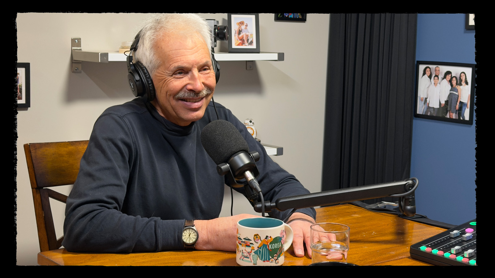 Podcast guest Oly smiling at the microphone during an OverArch Podcast recording.
